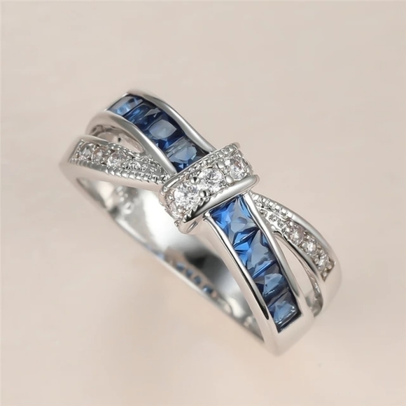 Blue Sapphire Criss Cross 10k White Gold Plated Bow Ring - Picture 6 of 7